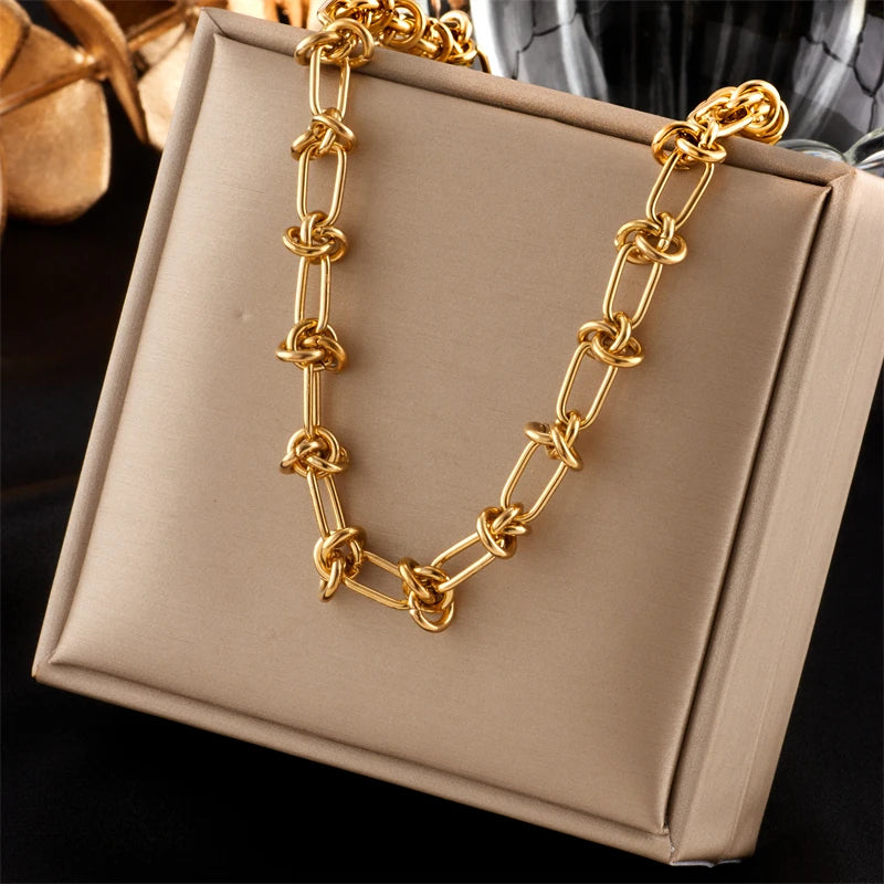 Set Collar y Pulsera Nudo Trenzado – Acero Inoxidable Dorado/Plateado